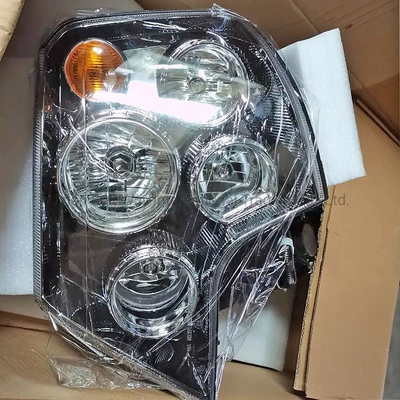 USD Pagamento apoiado Sinotruk HOWO A7 Lâmpada de cabeça esquerda Farol de montagem Wg9925720001